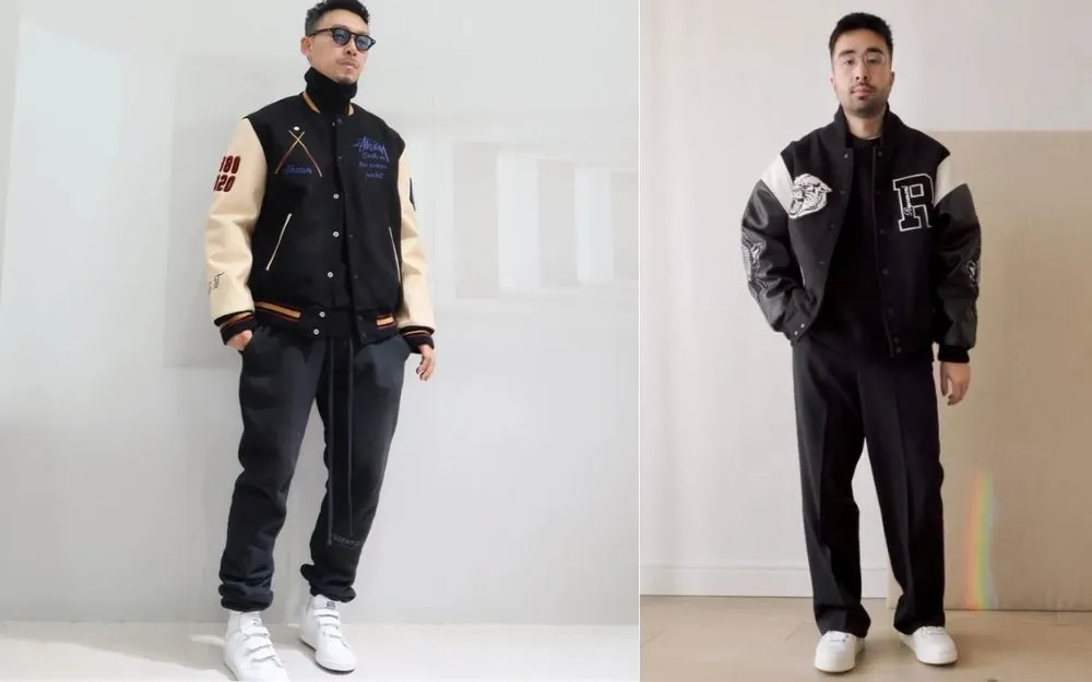 Wearing a varsity jacket in winter with a sweater and black jeans